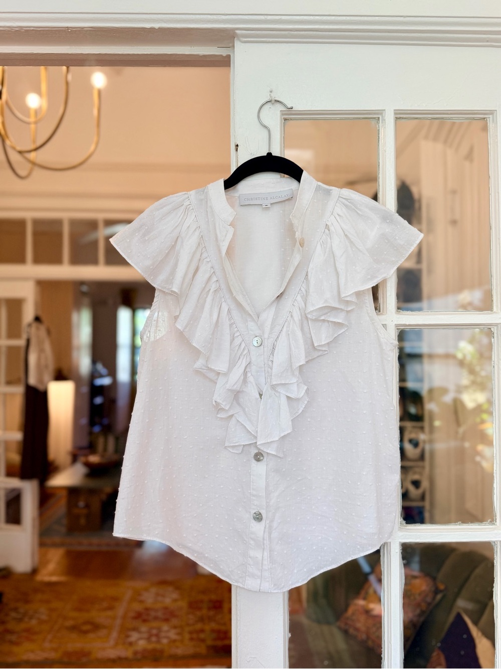 White Ruffle Front Sleeveless Blouse